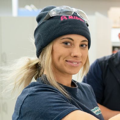 Photo of a trades student in a workshop.