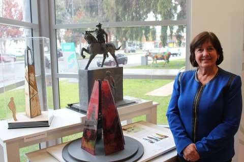 Mayor Jenny Houlihan in front of designs for Sir Murray Bourchier designs