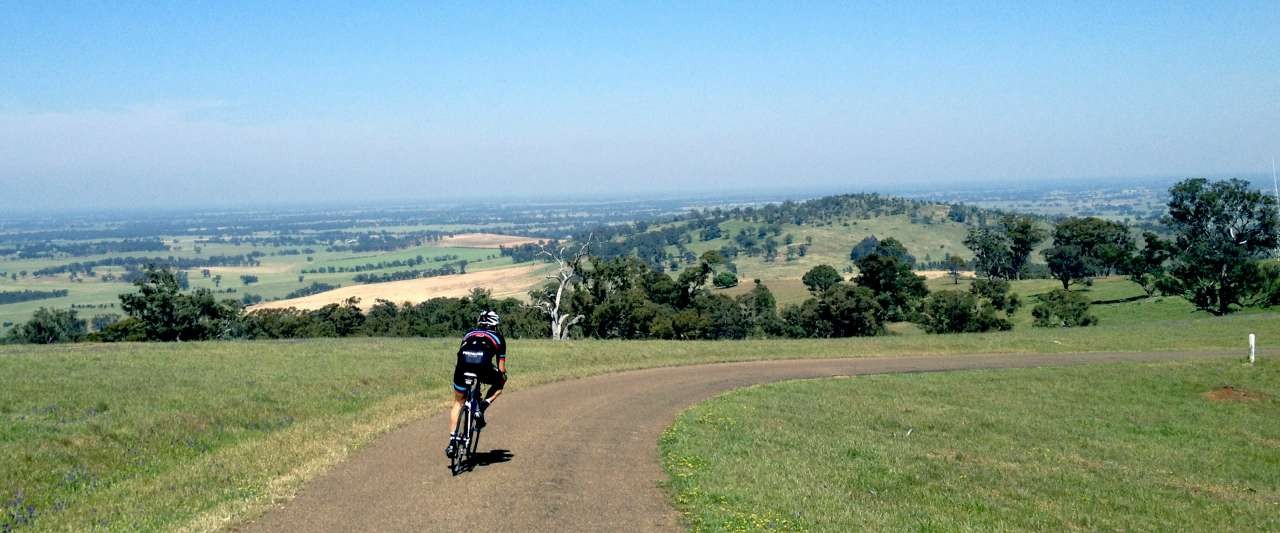 Cycling down TV Access Rd on top of Greater Shepparton's highest point, Mt Major.