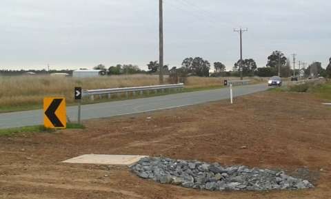 Channel Road works complete, with pipes and guardrail installed, July 2015.