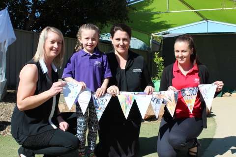 Maddison with her mum Michelle and Guthrie St Child Care staff Frances and Naomi 